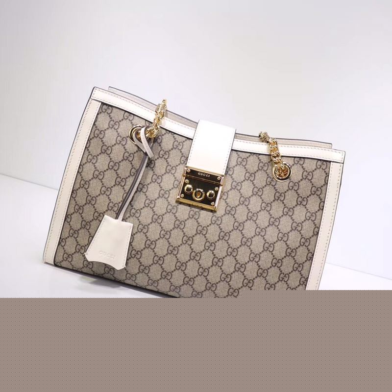 G*u*i shopping bags
